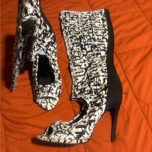 Elegant Black and White Heeled Boots